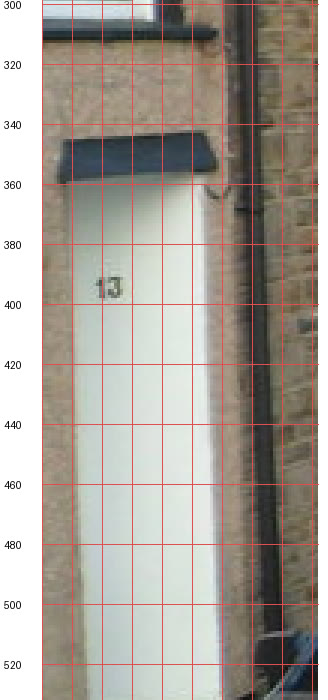 An enlarged crop of a doorway on Lee Street, Pontypridd, where the house number 13 is readable, on a pixel grid.