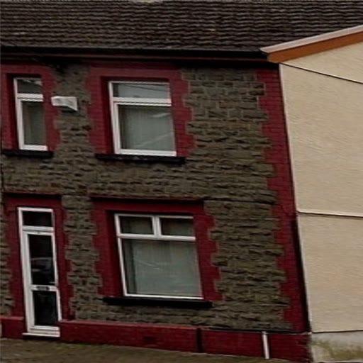 The outlined house front straightened into a flat, square view of its windows, door and stonework.