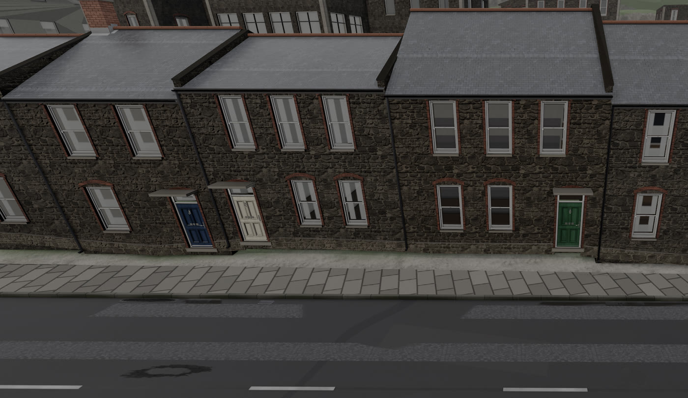 A stone terrace in VeriStreet seen from across the road, with sash windows, blue, cream and green doors, slate roofs, a paved footway and road markings.